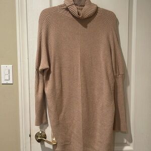 Medium oversized sweater or dress.